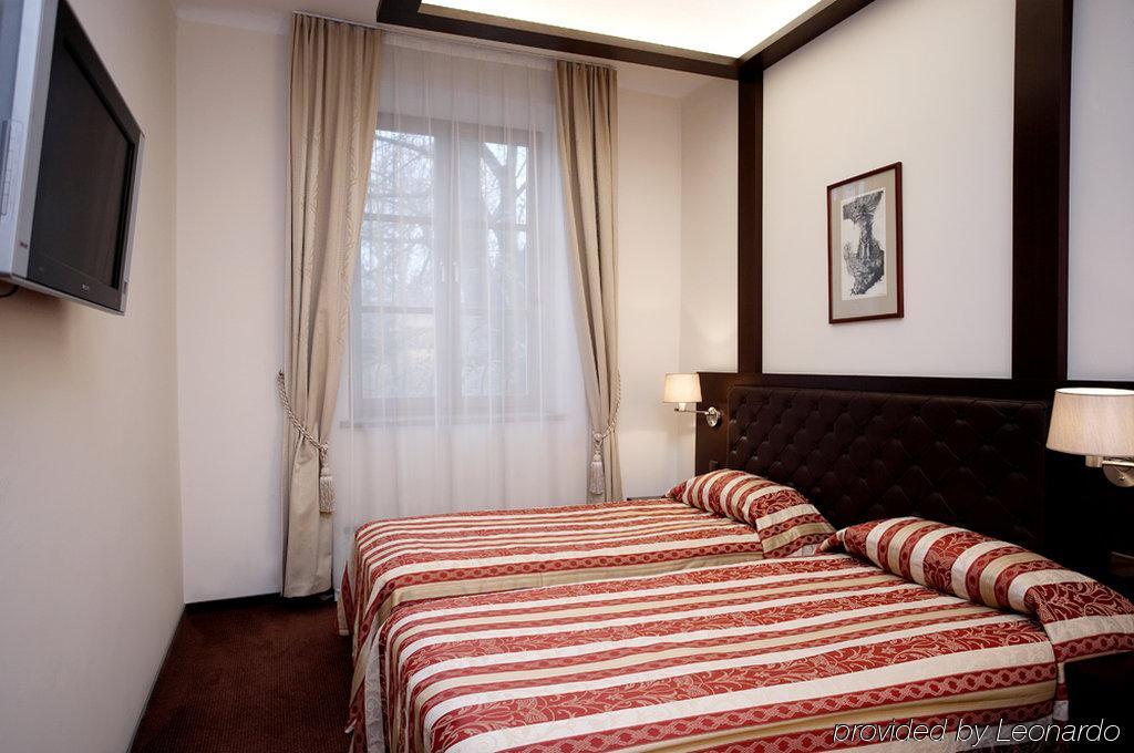 Amberton Cozy Hotel Kaunas Habitación foto